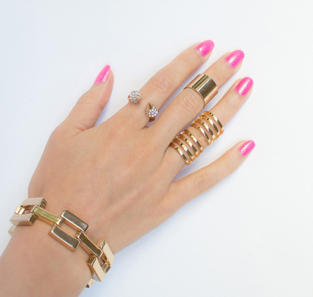 Edgy-gold-rings-pink-nails